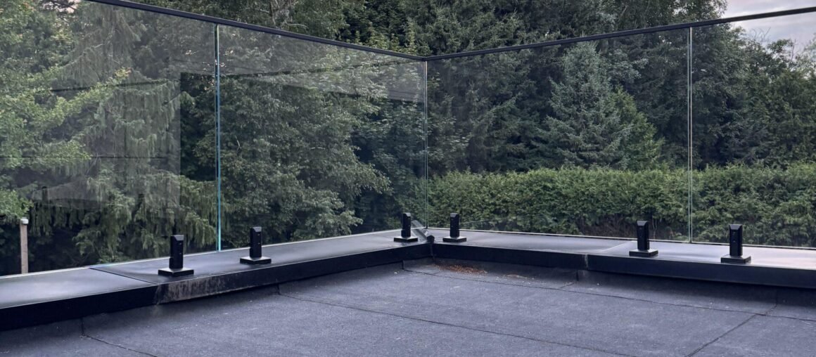Elevated outdoor terrace with custom railing
