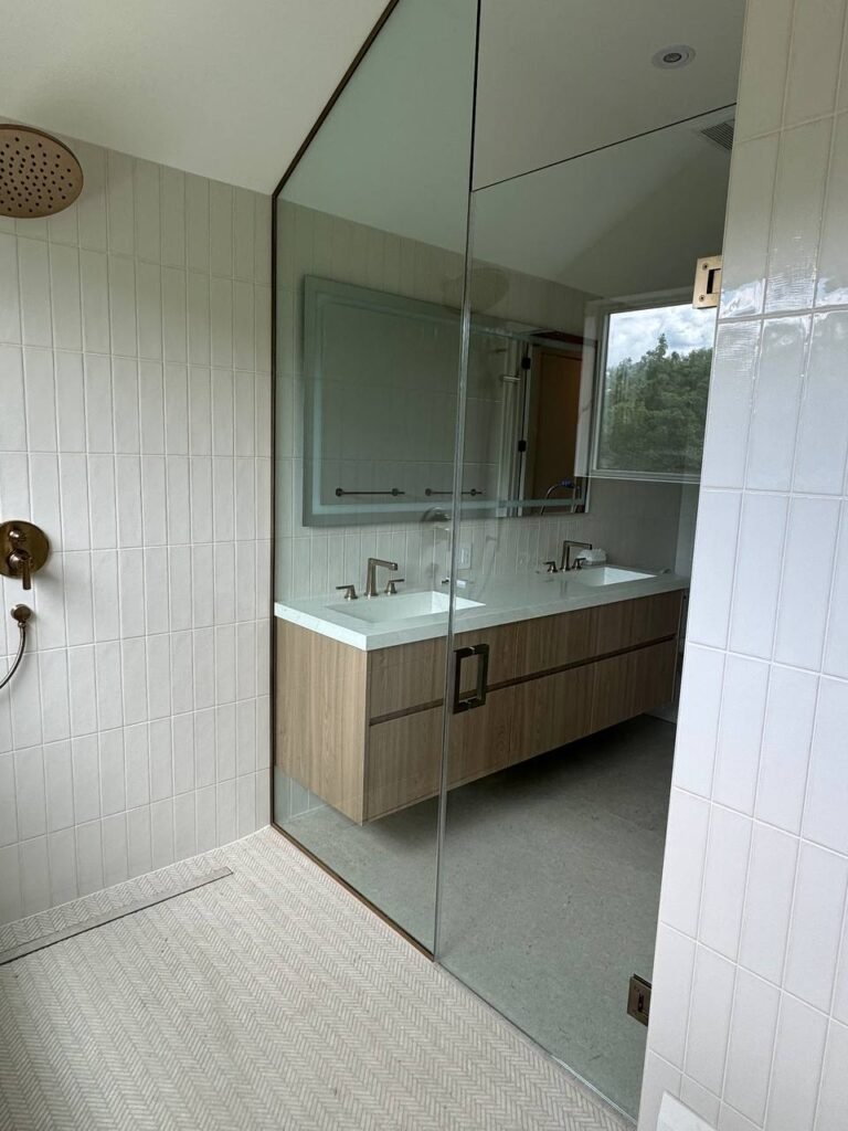 Glass shower enclosure